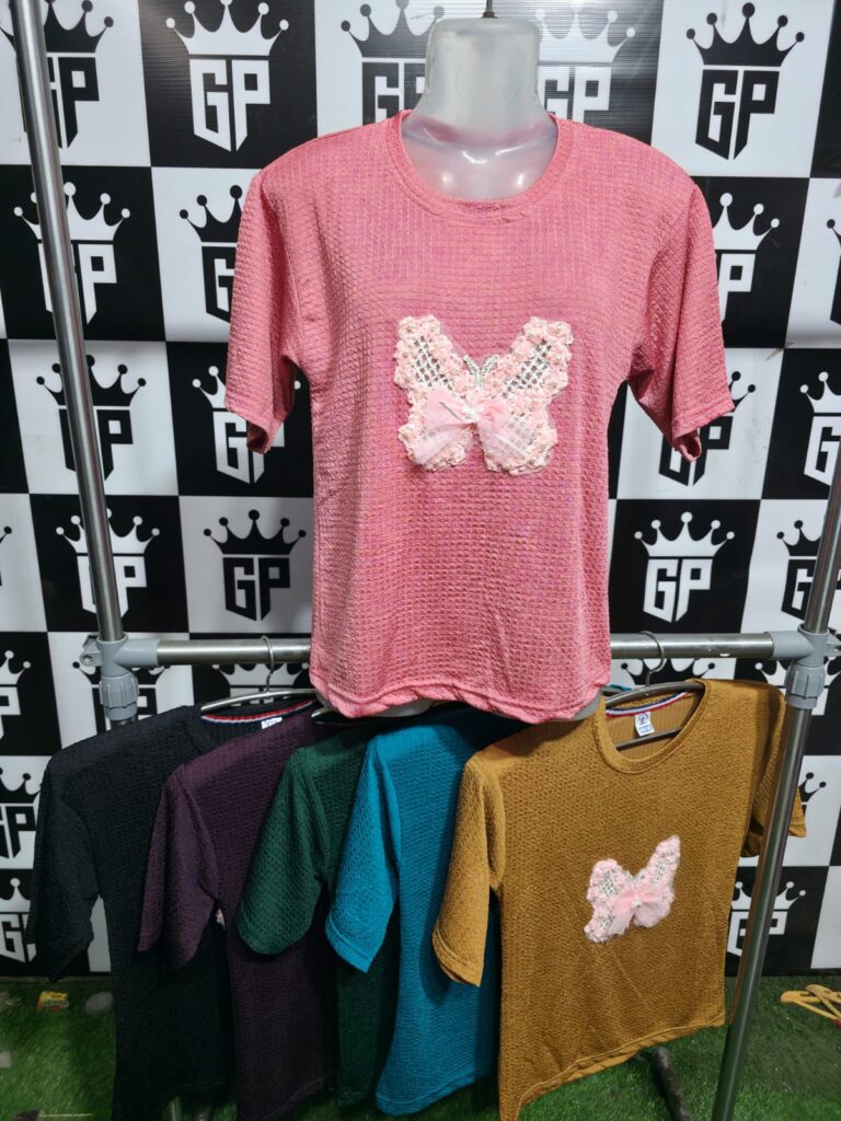 "Fashionable pink top for young girls"