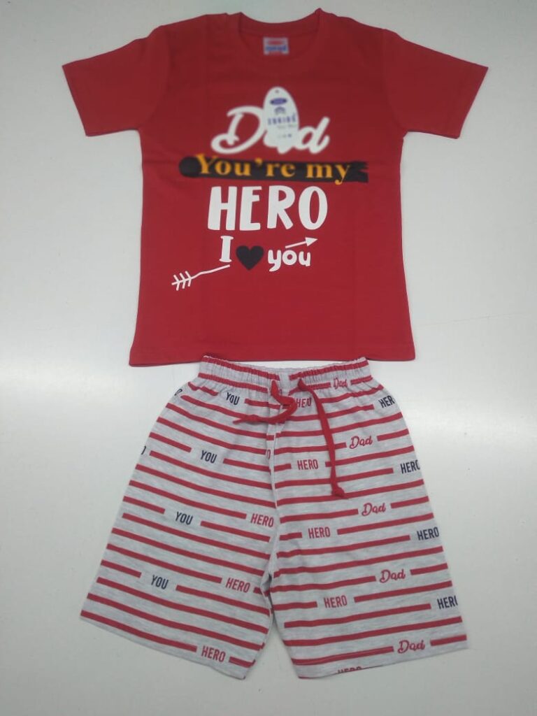 Happy toddler boy playing outside wearing a comfortable cotton 2-piece short set. cloth store near me.